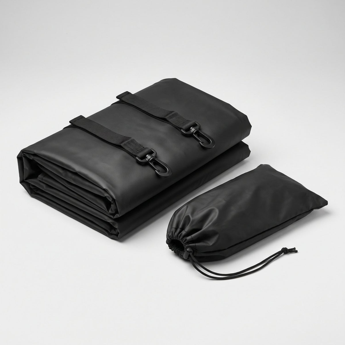 Housse pliée avec son sac de rangement
